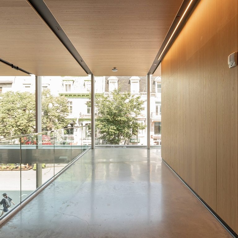 Installation of Wood Wall Coverings - Espace St-Denis.